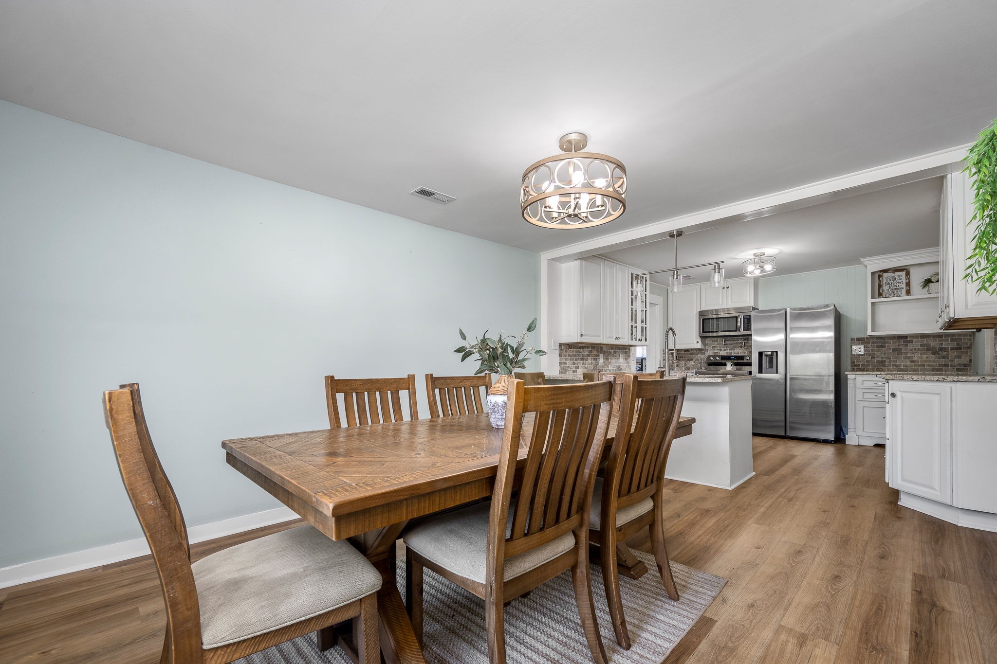 2180 Polly Adams Road Petersburg, TN 37144 - Photo 22 of 57 a view of a dining room with furniture and wooden floor