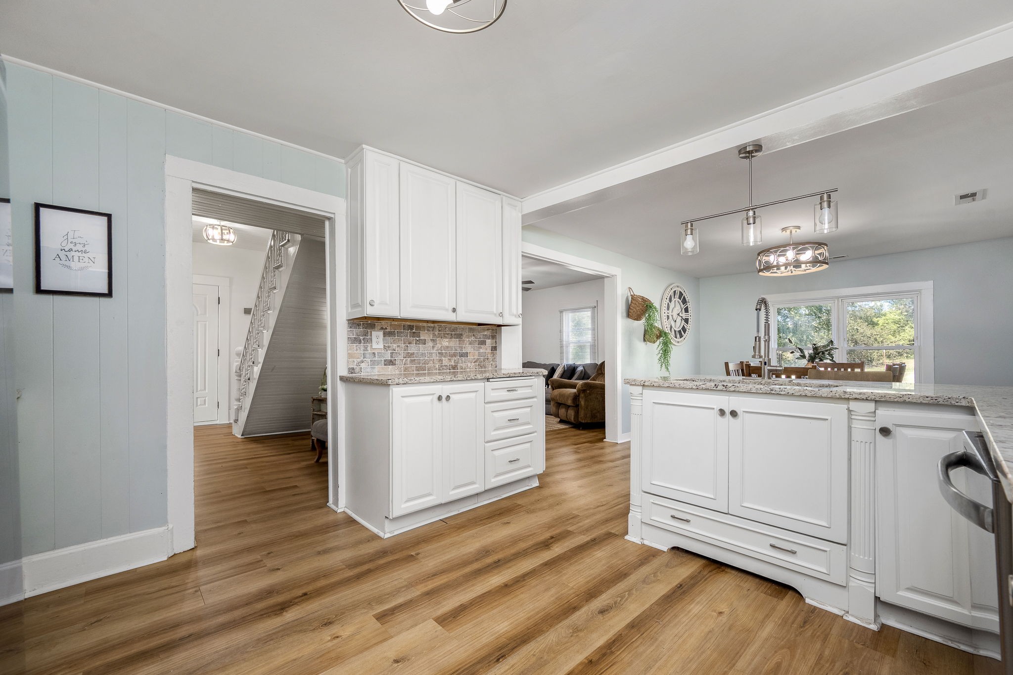 2180 Polly Adams Road Petersburg, TN 37144 - Photo 26 of 57 a kitchen with cabinets wooden floor and a fireplace