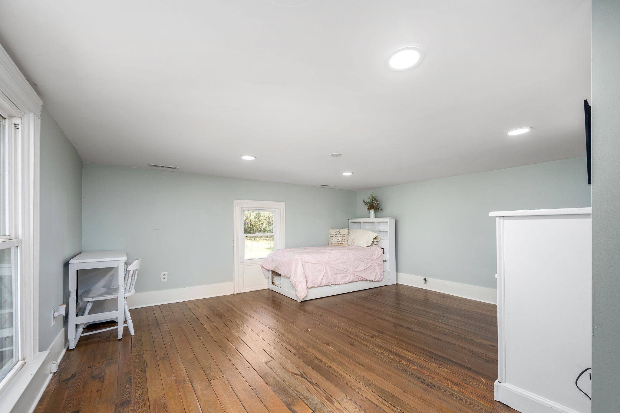2180 Polly Adams Road Petersburg, TN 37144 - Photo 31 of 57 a large room with wooden floor and furniture