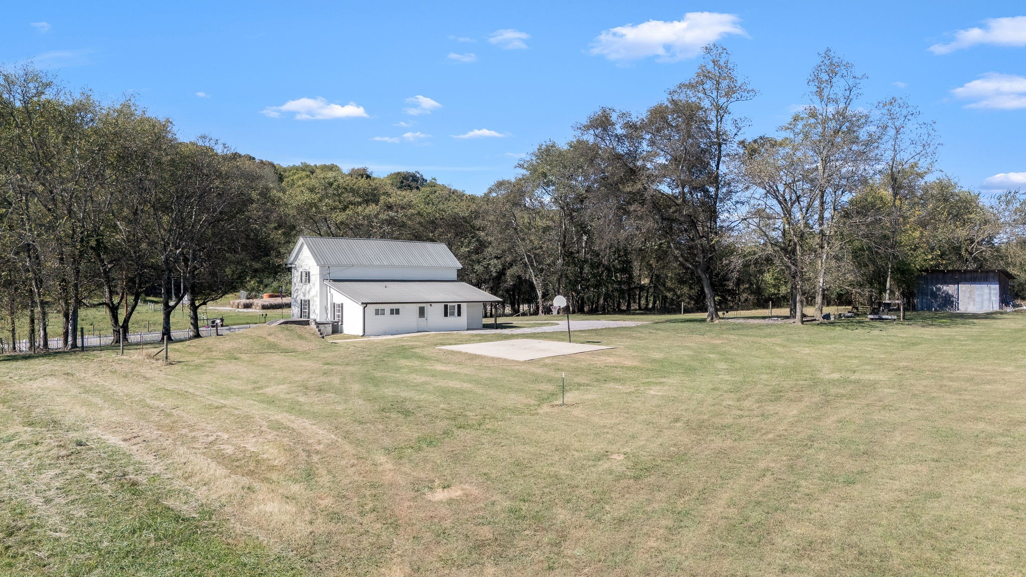 2180 Polly Adams Road Petersburg, TN 37144 - Photo 45 of 57 a view of a field with trees in the background