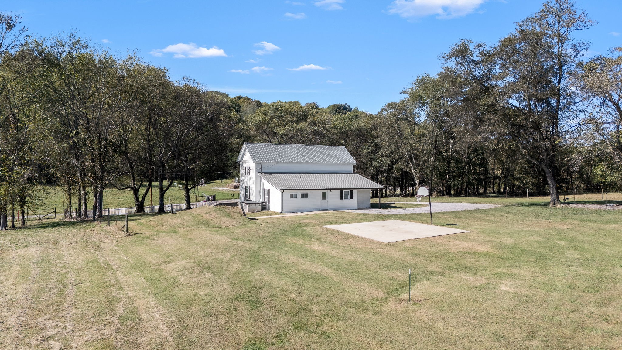 2180 Polly Adams Road Petersburg, TN 37144 - Photo 46 of 57 a house with trees in front of it