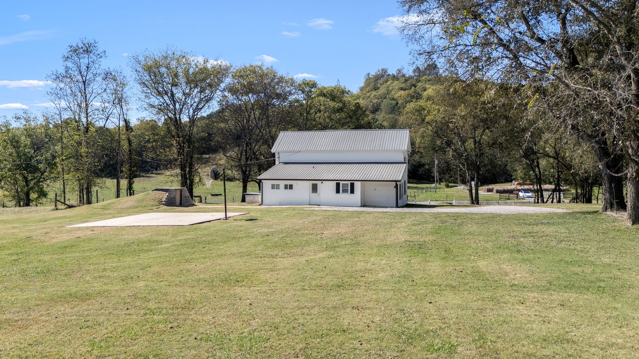 2180 Polly Adams Road Petersburg, TN 37144 - Photo 49 of 57 a view of a house with a yard and sitting area