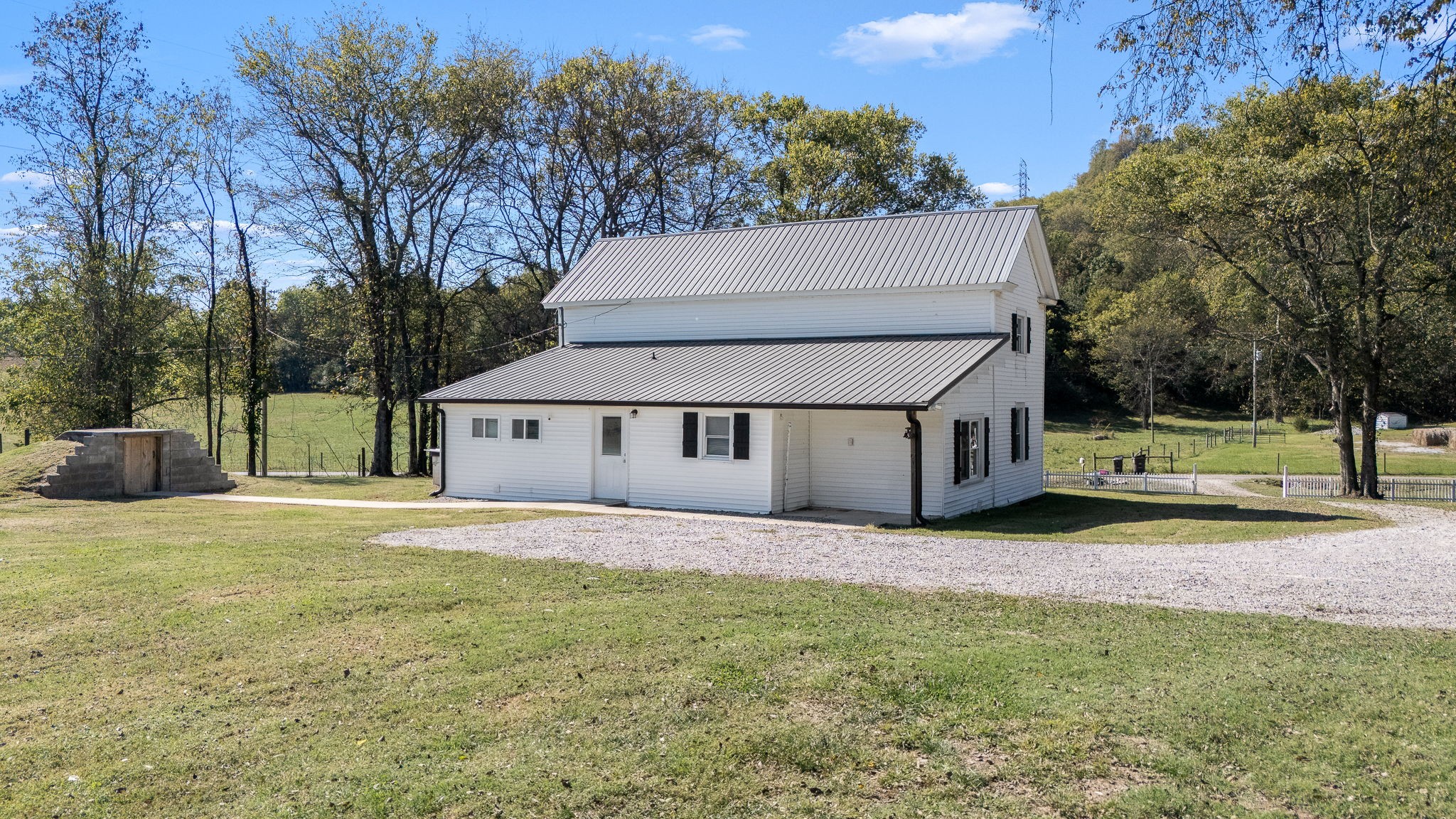 2180 Polly Adams Road Petersburg, TN 37144 - Photo 50 of 57 a white house that has a tree in front of it