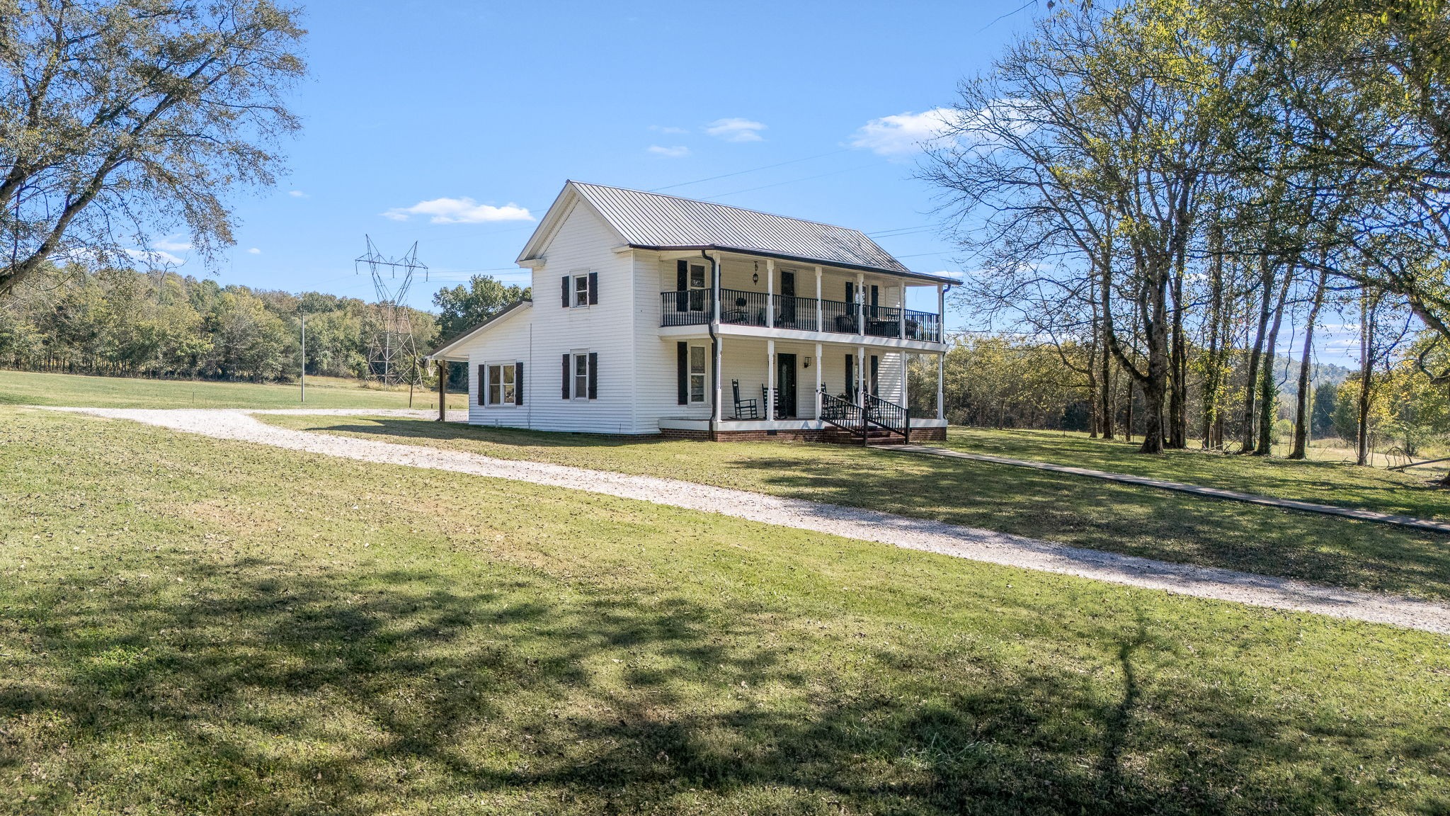 2180 Polly Adams Road Petersburg, TN 37144 - Photo 8 of 57 a view of a house with a big yard and large trees