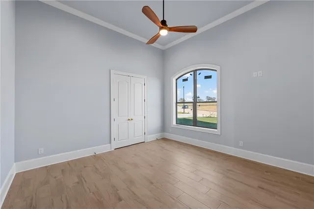 a bathroom with a sink vanity granite and toilet