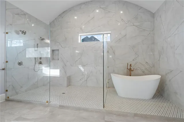 a view of living room with a sink and dishwasher with a large mirror next to a yard