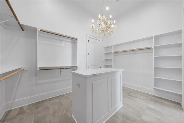 a kitchen with stainless steel appliances granite countertop a sink and a stove
