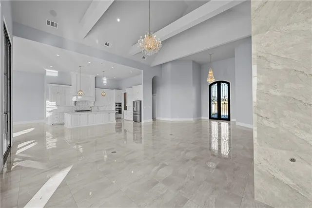 a view of front door and small yard