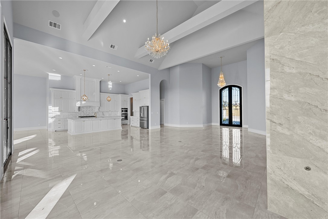 129 Iris Street Lorena, TX 76655 - Photo 47 of 56 a view of a living room and chandelier