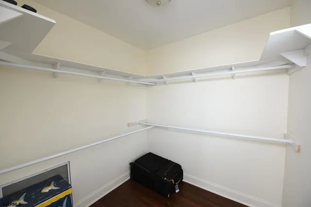 a view of an empty walk in closet