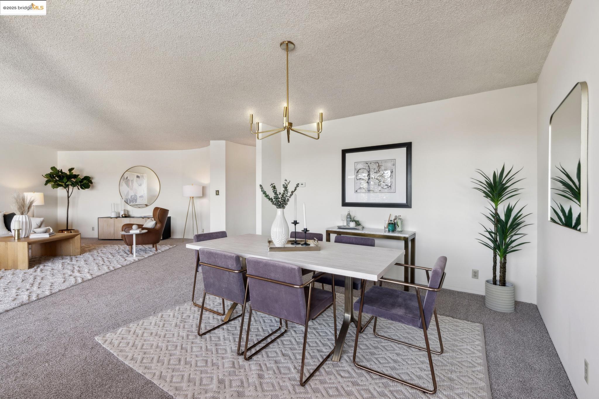 177 19th Street, Unit 5A Oakland, CA 94612 - Photo 14 of 49 a view of a livingroom with furniture window and wooden floor