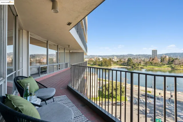 a view of balcony with furniture