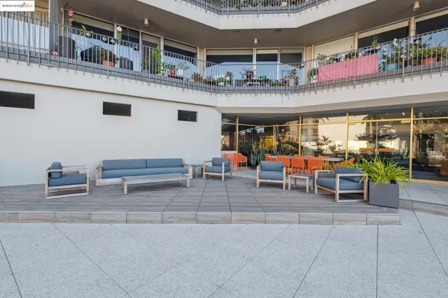a outdoor space with lots of table and chairs