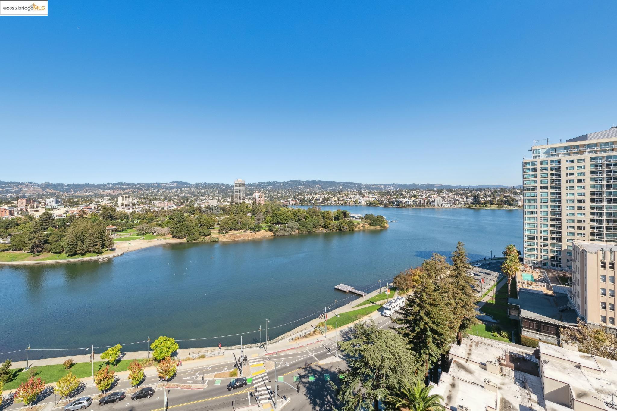 177 19th Street, Unit 5A Oakland, CA 94612 - Photo 46 of 49 a view of a lake with a city