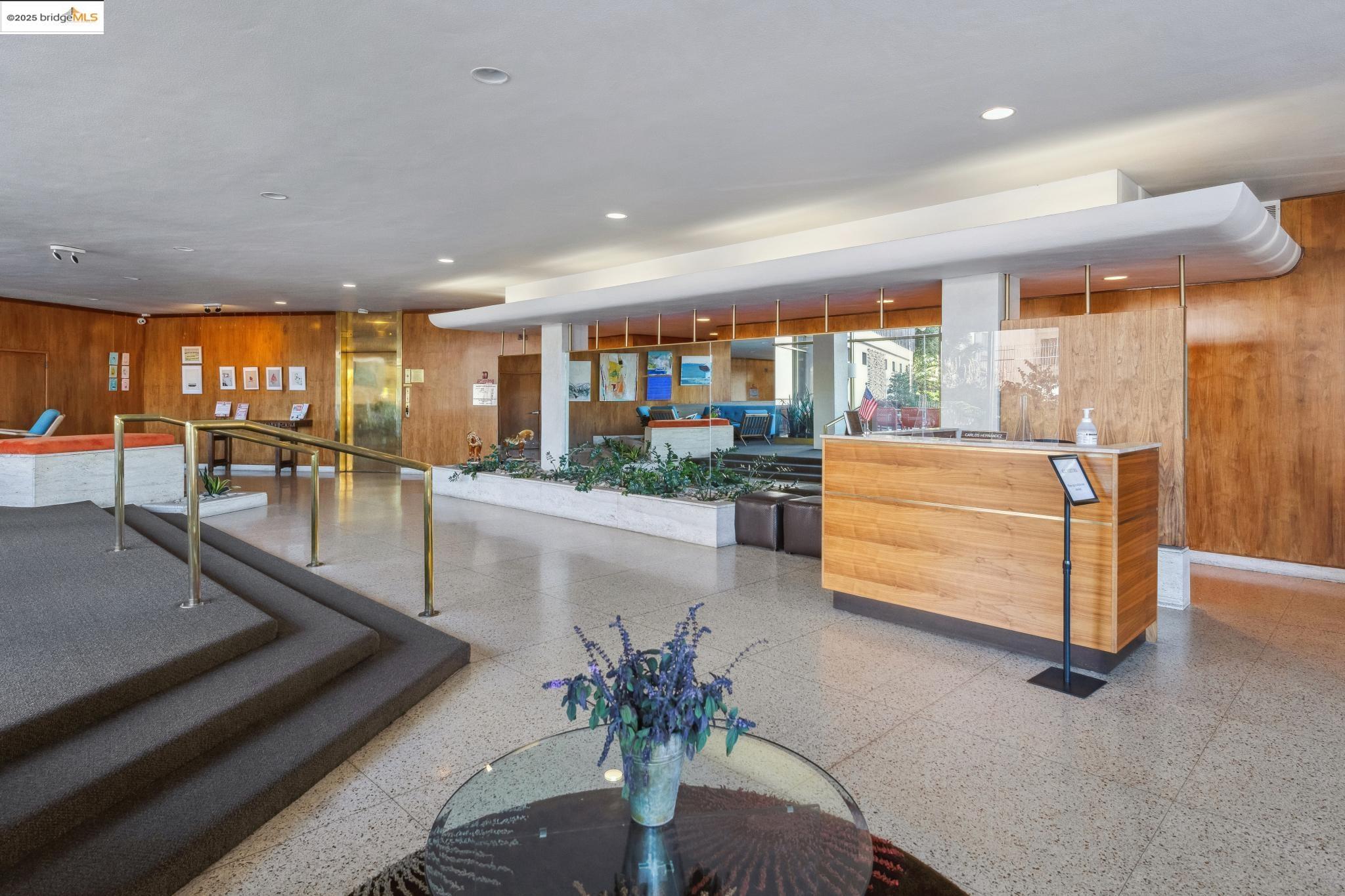 177 19th Street, Unit 5A Oakland, CA 94612 - Photo 7 of 49 a lobby with furniture and window