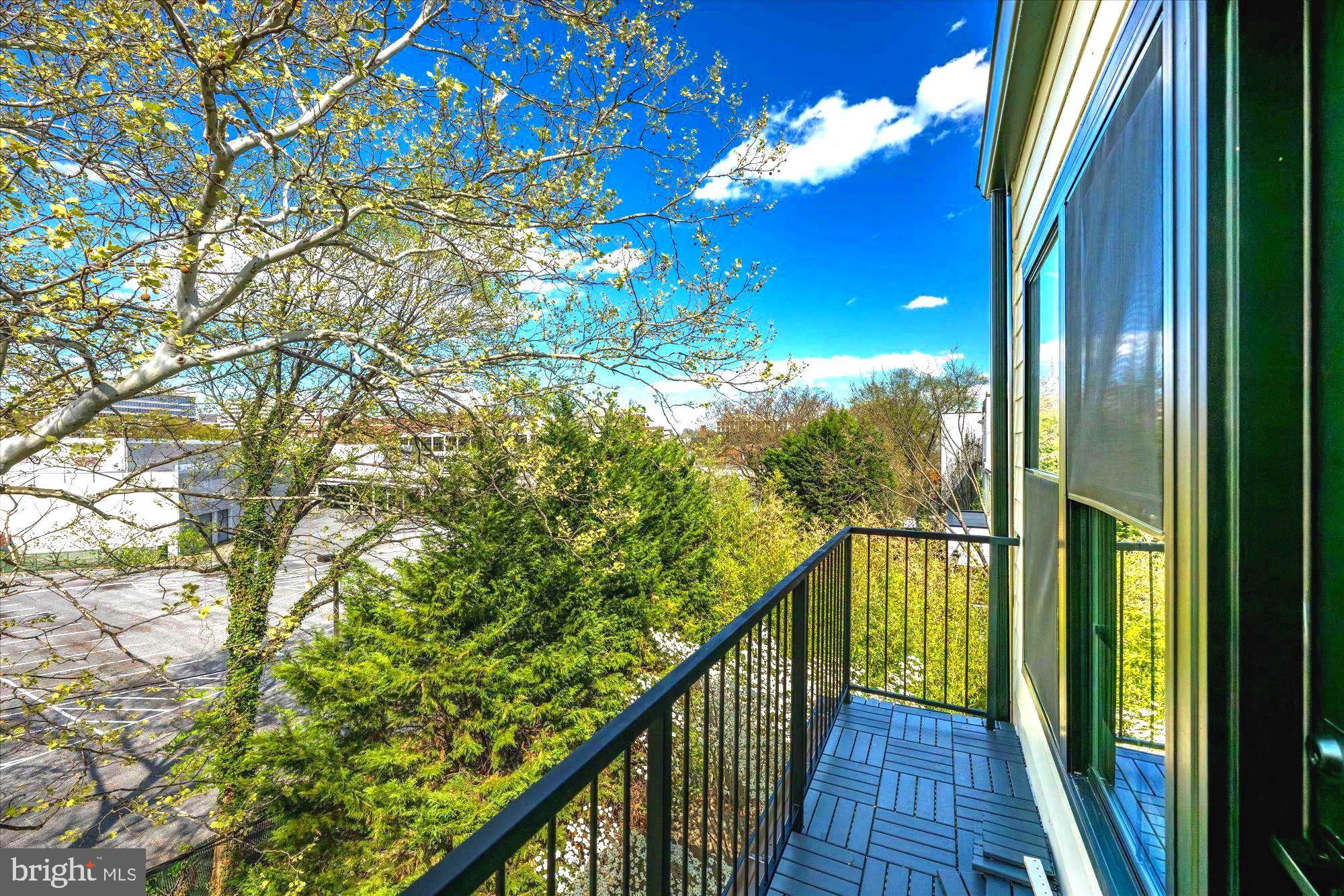 4441 Harrison Street Northwest Washington, DC 20015 - Photo 25 of 43 a view of balcony with wooden floor