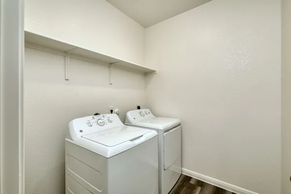 a utility room with dryer and washer