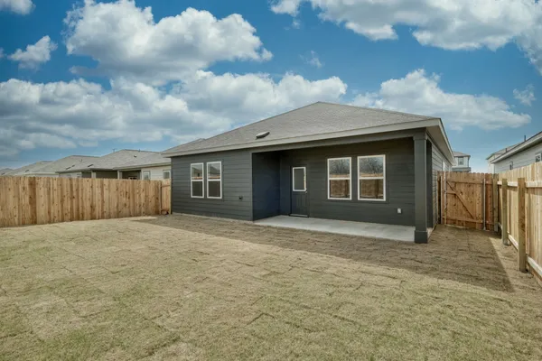 a front view of a house with yard