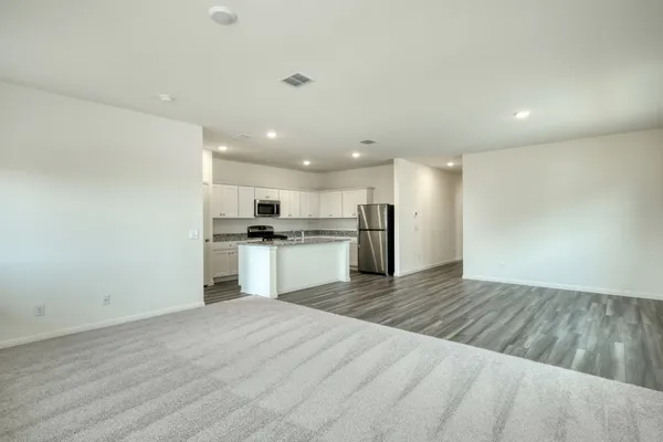 a black and white photo of a living room