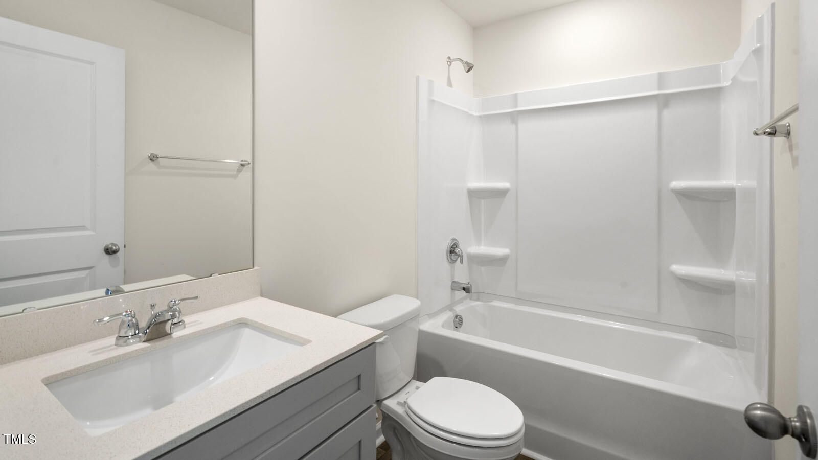 6016 Sodium Street Raleigh, NC 27610 - Photo 14 of 22 a bathroom with a sink toilet and shower