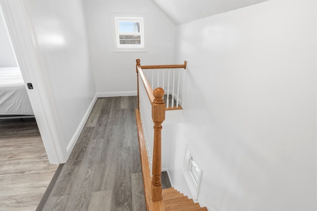 104 Temple Street Gardner, MA 01440 - Photo 22 of 40 a view of hallway with wooden floor