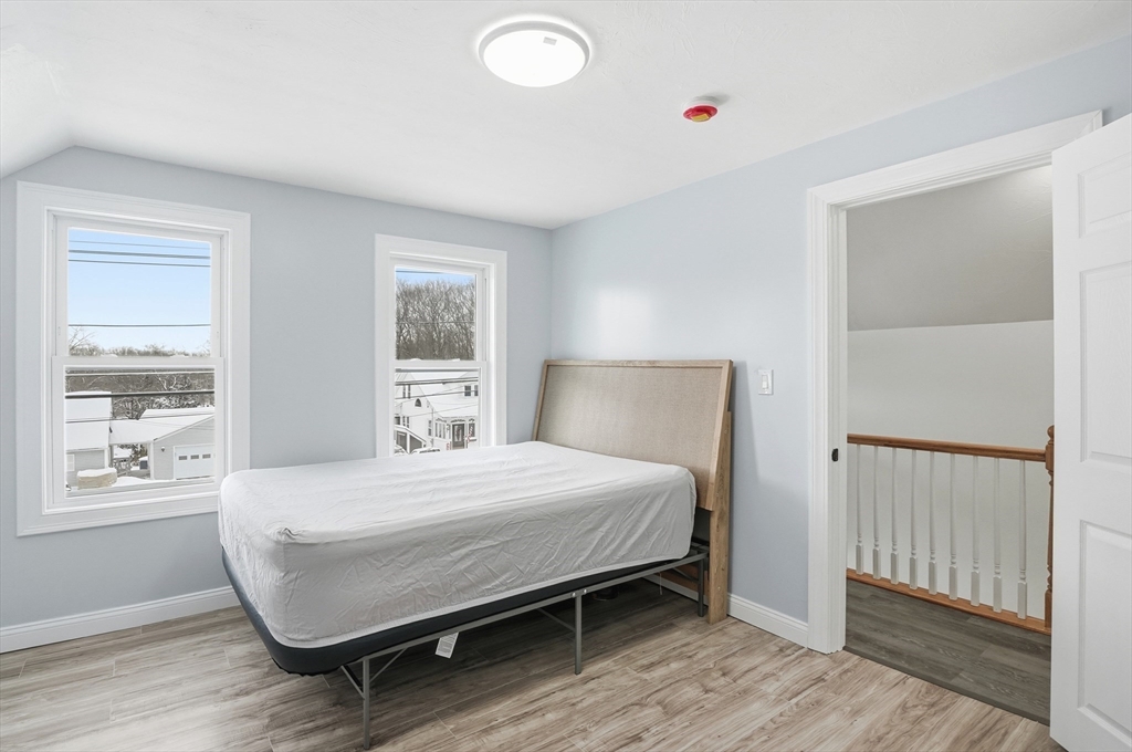 104 Temple Street Gardner, MA 01440 - Photo 24 of 40 a bedroom with a bed and a window