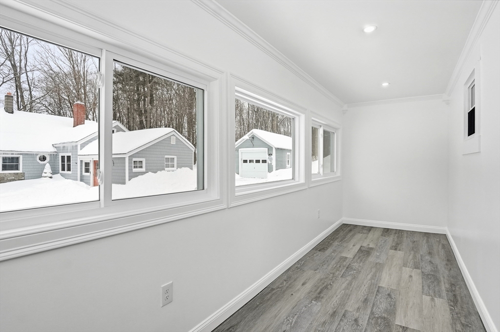 104 Temple Street Gardner, MA 01440 - Photo 3 of 40 a view of a house with a balcony and wooden floor