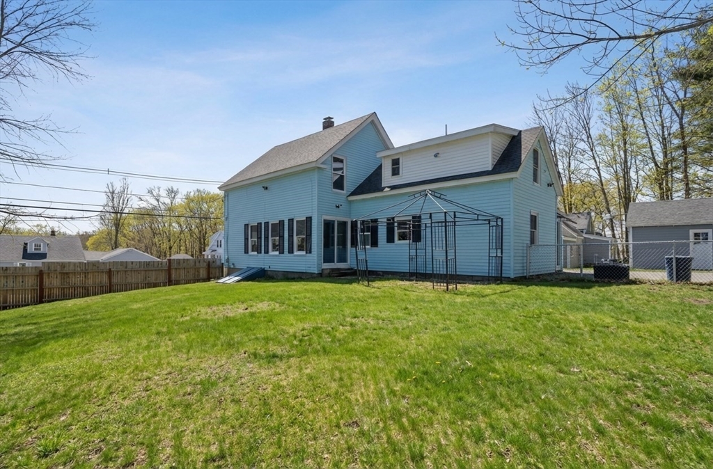 104 Temple Street Gardner, MA 01440 - Photo 35 of 40 a view of a house with a big yard plants and large trees