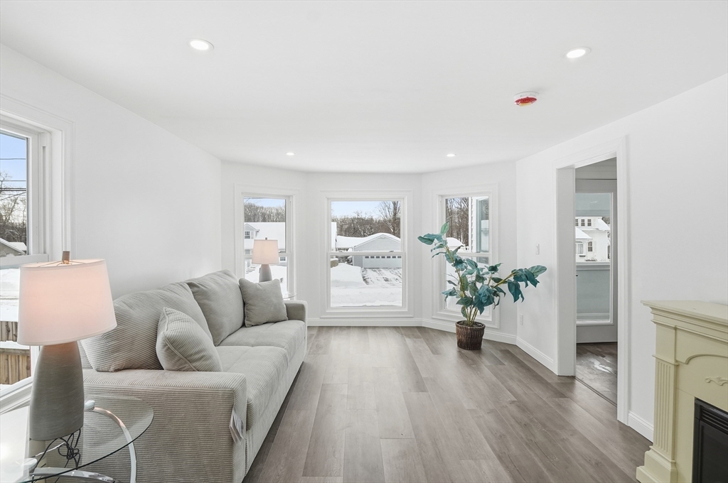 104 Temple Street Gardner, MA 01440 - Photo 6 of 40 a living room with furniture and wooden floor