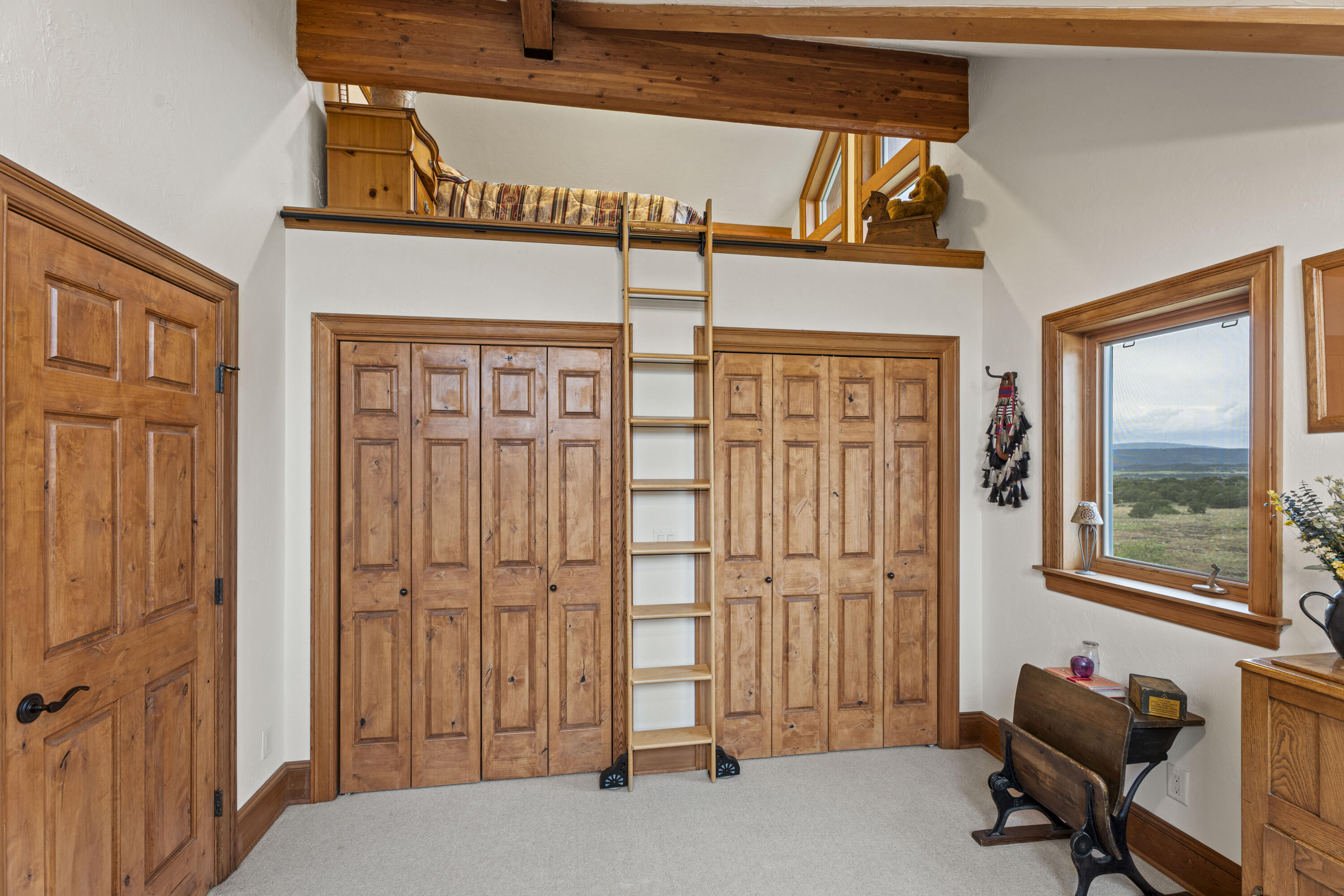 3100 South County Road Norwood, CO 81423 - Photo 26 of 44 a view of a livingroom with furniture and windows