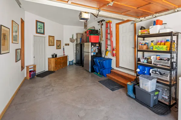 a view of store room with clothes and shoes