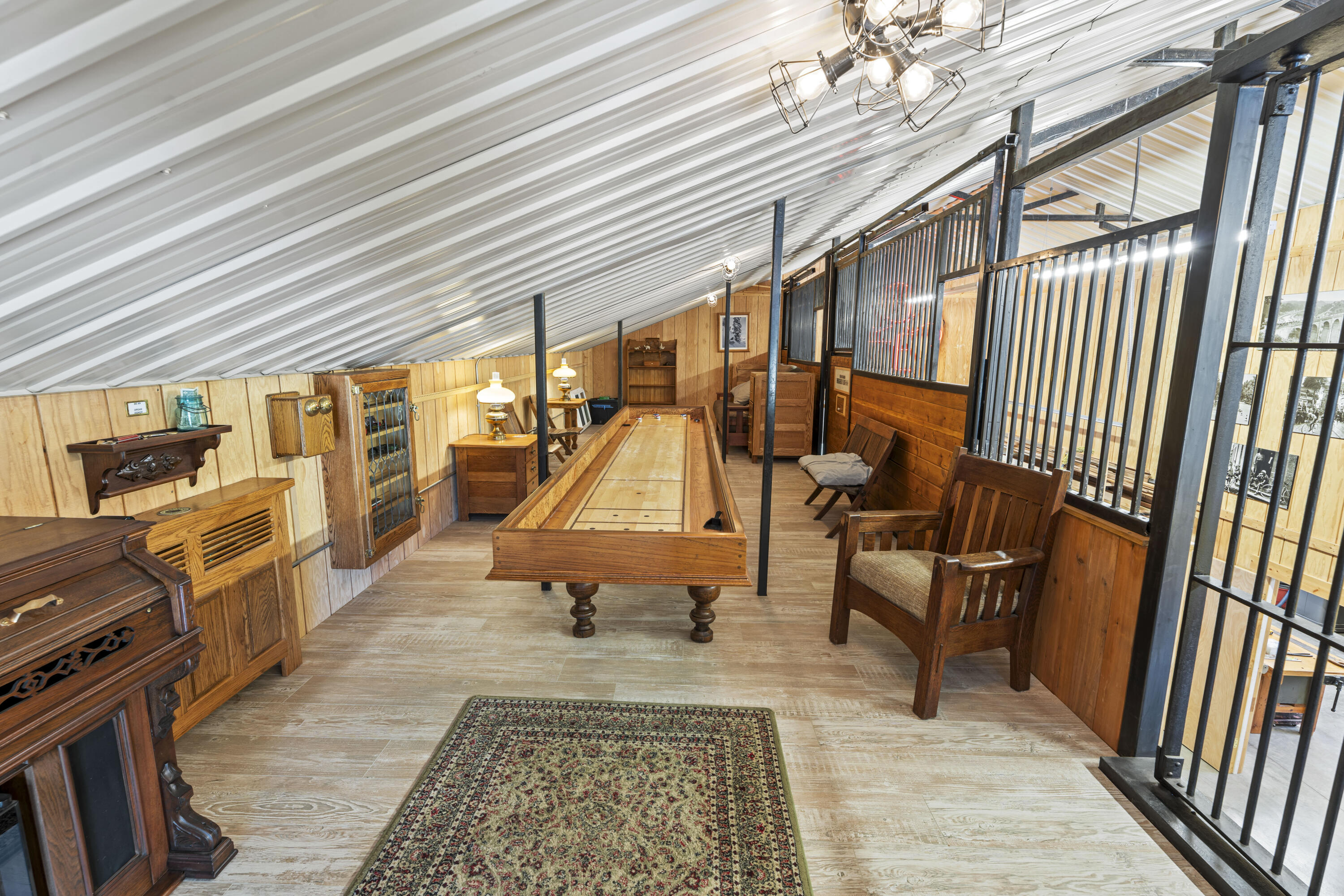 3100 South County Road Norwood, CO 81423 - Photo 36 of 44 wooden floor view with two chairs and a table