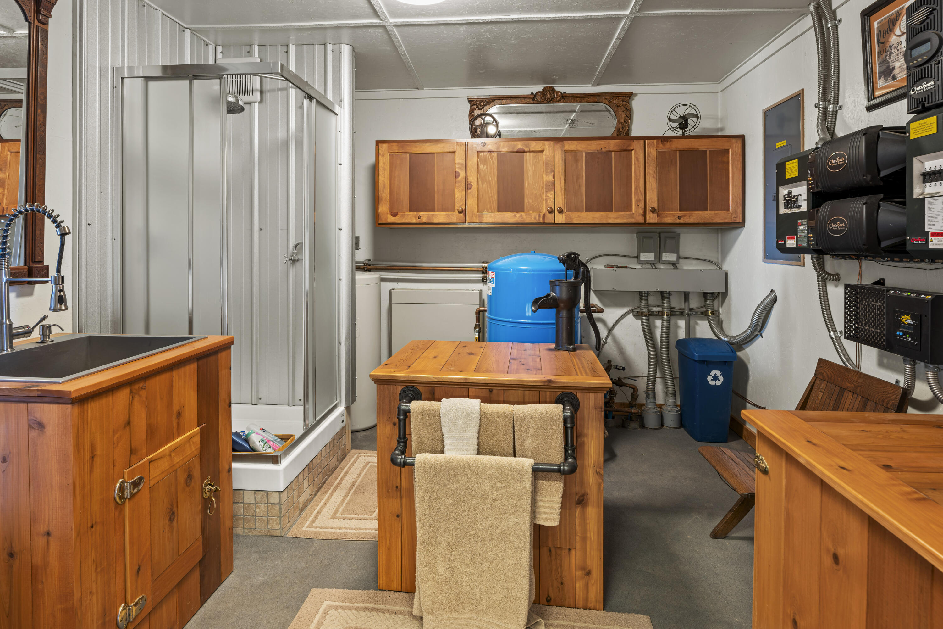 3100 South County Road Norwood, CO 81423 - Photo 42 of 44 a storage room with wooden floor and furniture