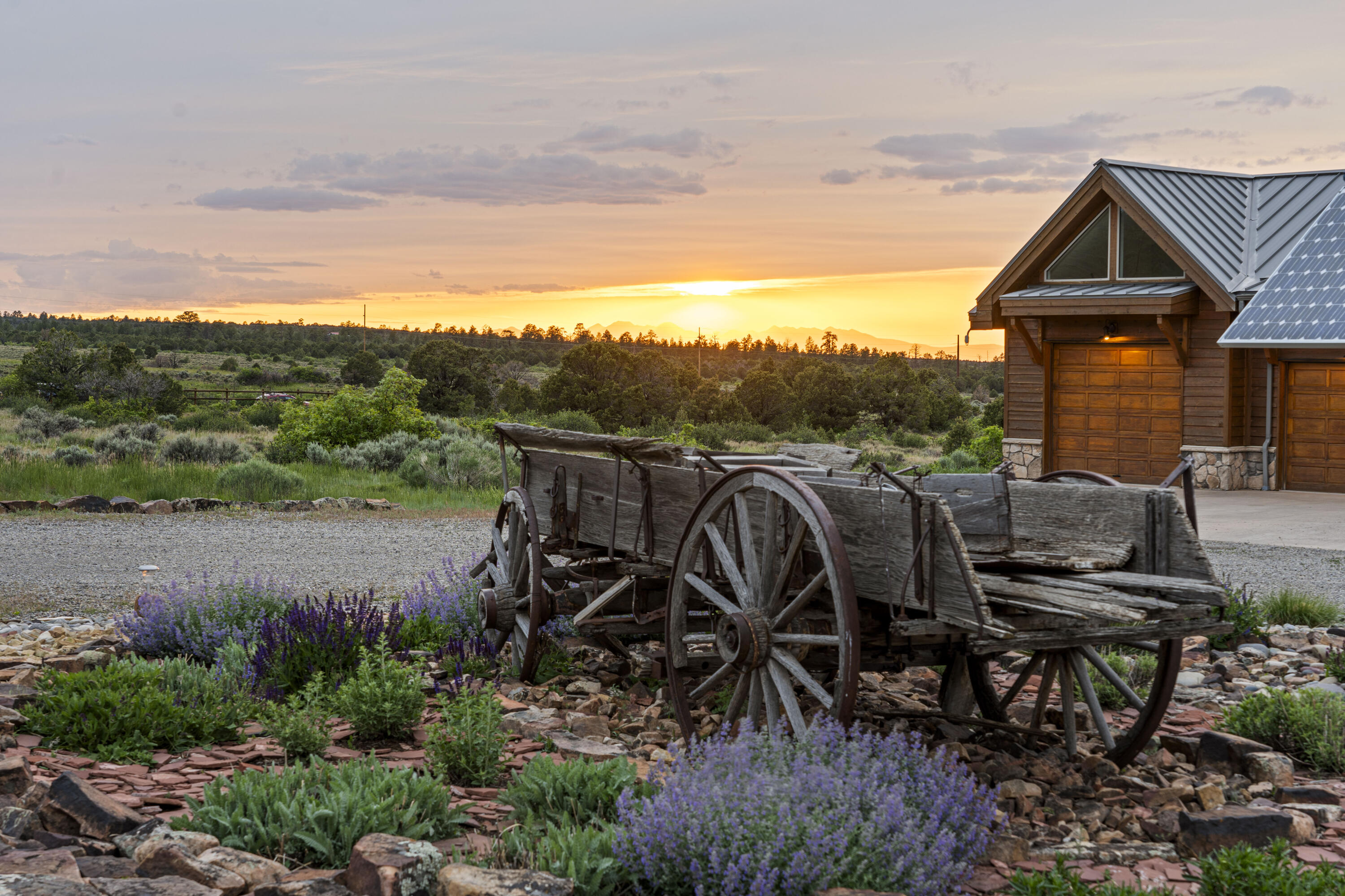 3100 South County Road Norwood, CO 81423 - Photo 6 of 44 a view of a patio with chairs and table of the ocean