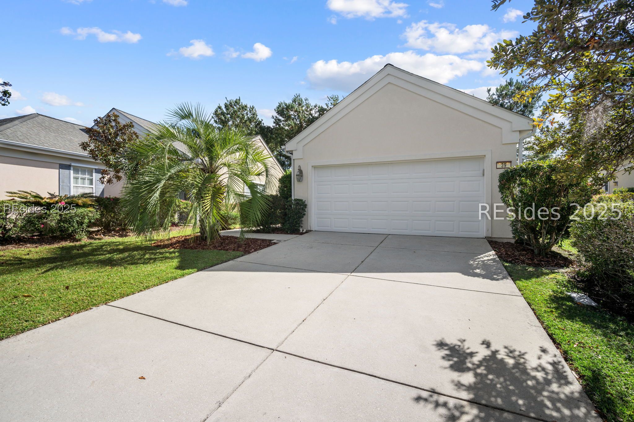 39 Nesting Lane Bluffton, SC 29909 - Photo 2 of 32 2 car garage with spacious driveway