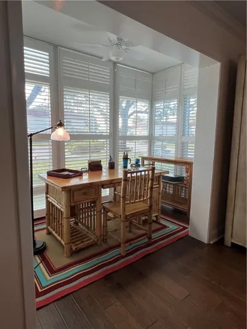 a bedroom with bed and window
