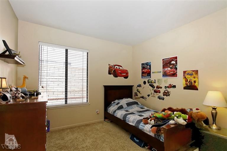 2704 Bitternut Circle Simi Valley, CA 93065 - Photo 14 of 25 a bedroom with furniture toys and a window