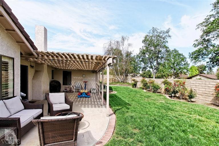 2704 Bitternut Circle Simi Valley, CA 93065 - Photo 19 of 25 a view of a patio with couches table and chairs and potted plants