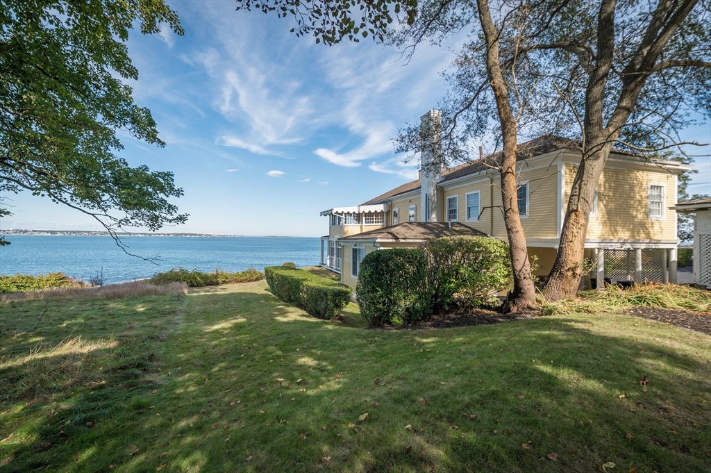 66 Ocean Street Nahant, MA 01908 - Photo 3 of 40 a view of a back yard of the house