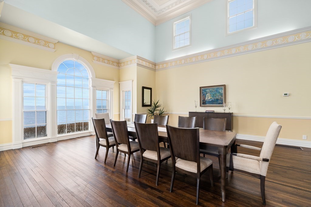 66 Ocean Street Nahant, MA 01908 - Photo 32 of 40 a view of a dining room with furniture and wooden floor