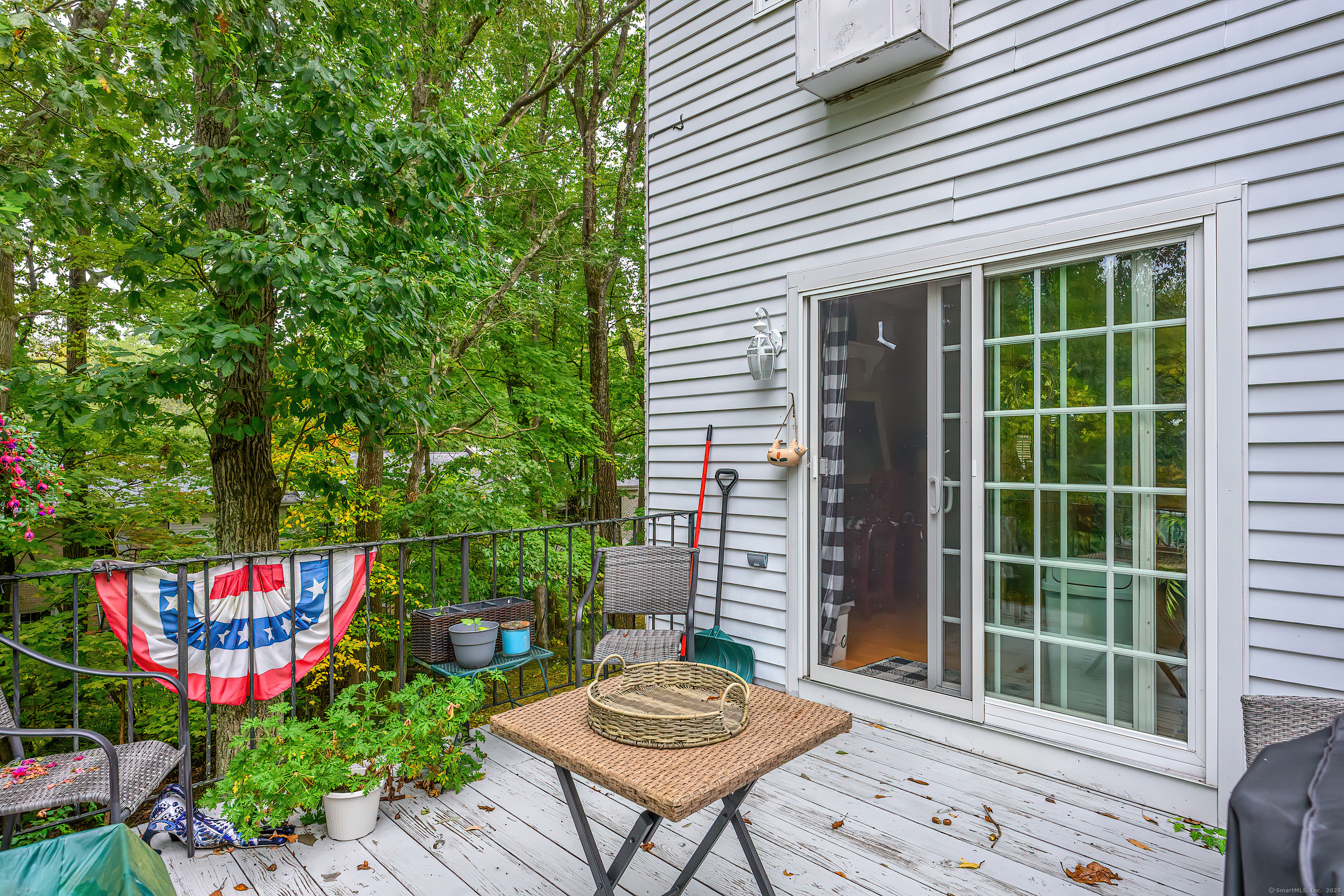 38 Surrey Lane, Unit 38 Torrington, CT 06790 - Photo 13 of 24 a view of a chairs and table in a patio