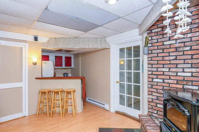 a kitchen with stainless steel appliances granite countertop a stove and a refrigerator