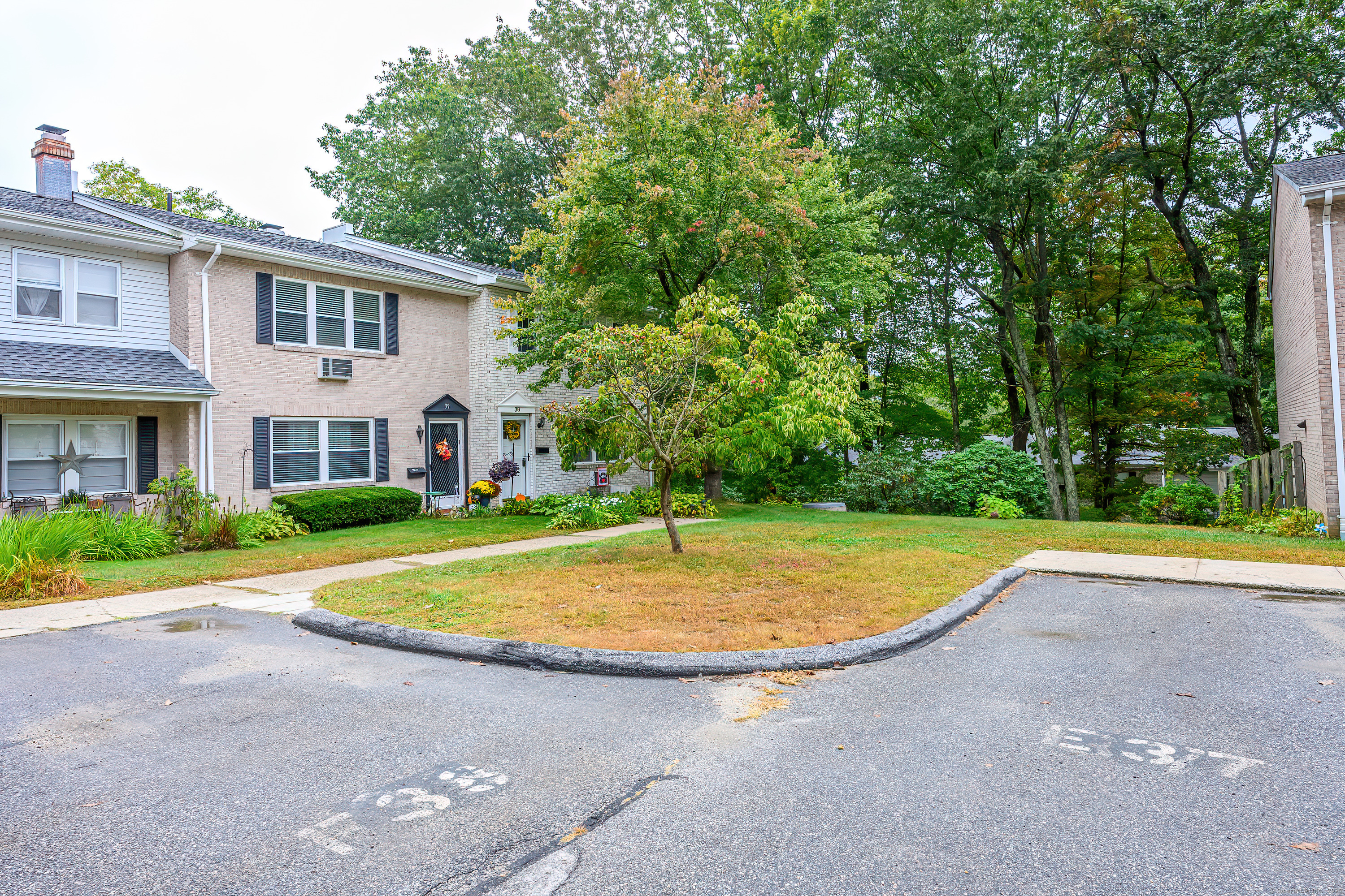 38 Surrey Lane, Unit 38 Torrington, CT 06790 - Photo 23 of 24 a view of outdoor space yard and swimming pool
