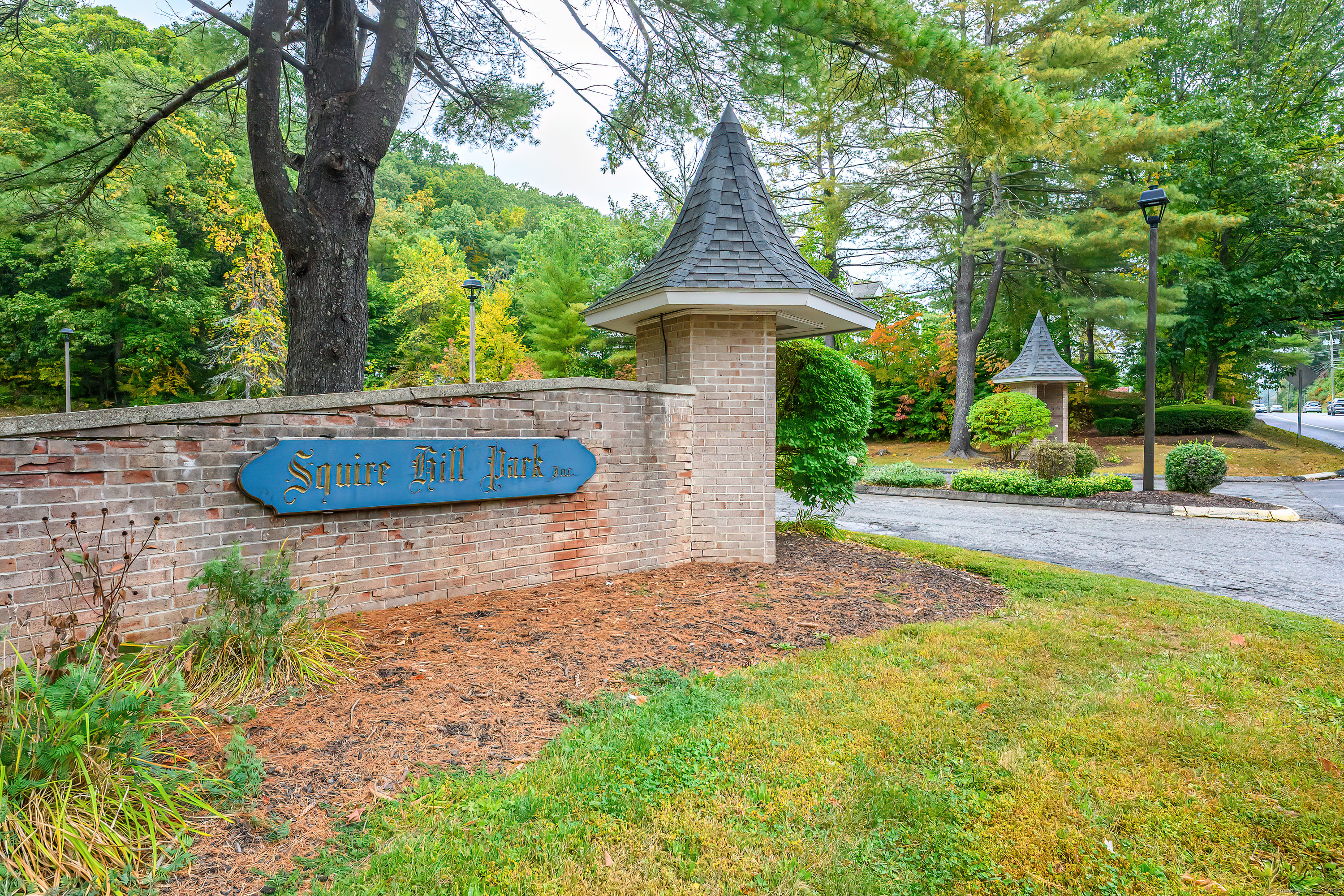 38 Surrey Lane, Unit 38 Torrington, CT 06790 - Photo 24 of 24 a front view of a house with garden