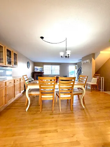 a dining room with lots of tables and chairs
