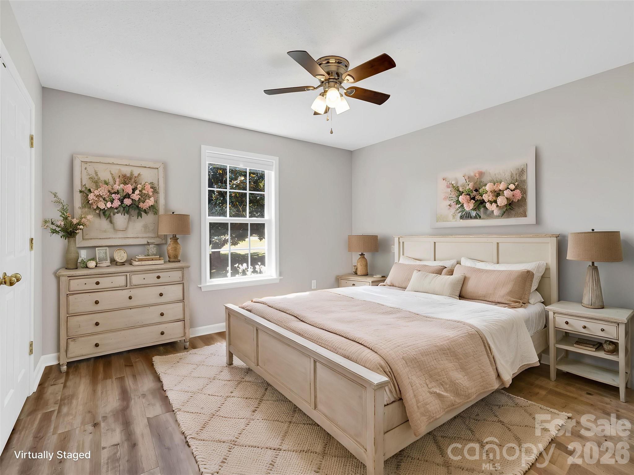 1249 Melvin Hill Road Campobello, SC 29322 - Photo 21 of 41 a bedroom with a large bed and a window