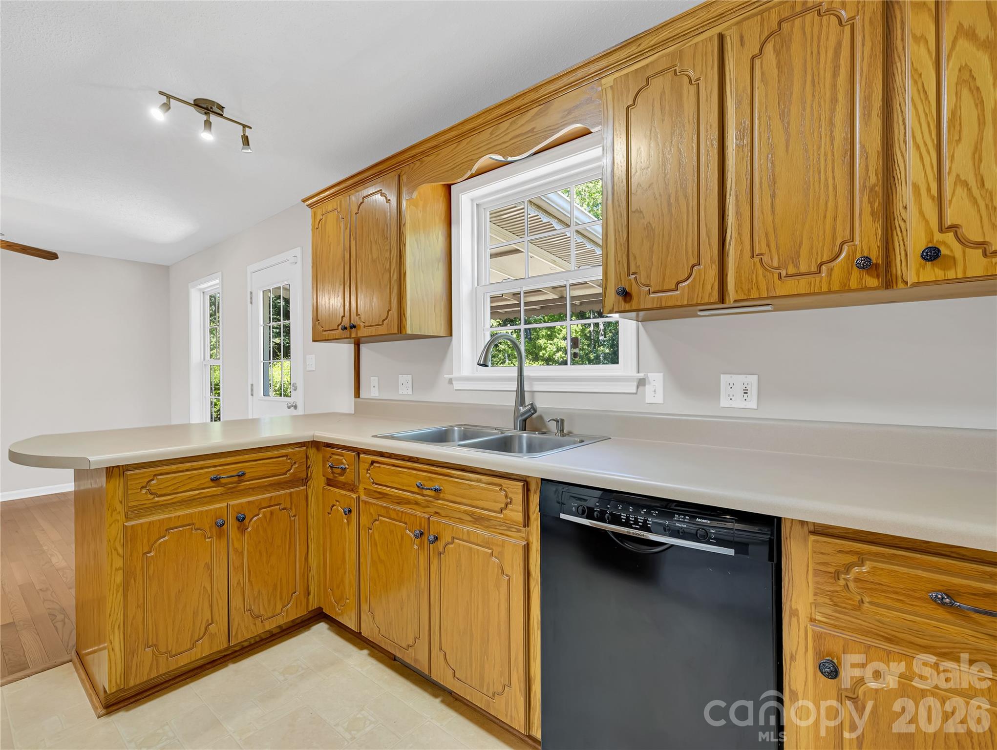 1249 Melvin Hill Road Campobello, SC 29322 - Photo 26 of 41 a kitchen with a sink stove and cabinets