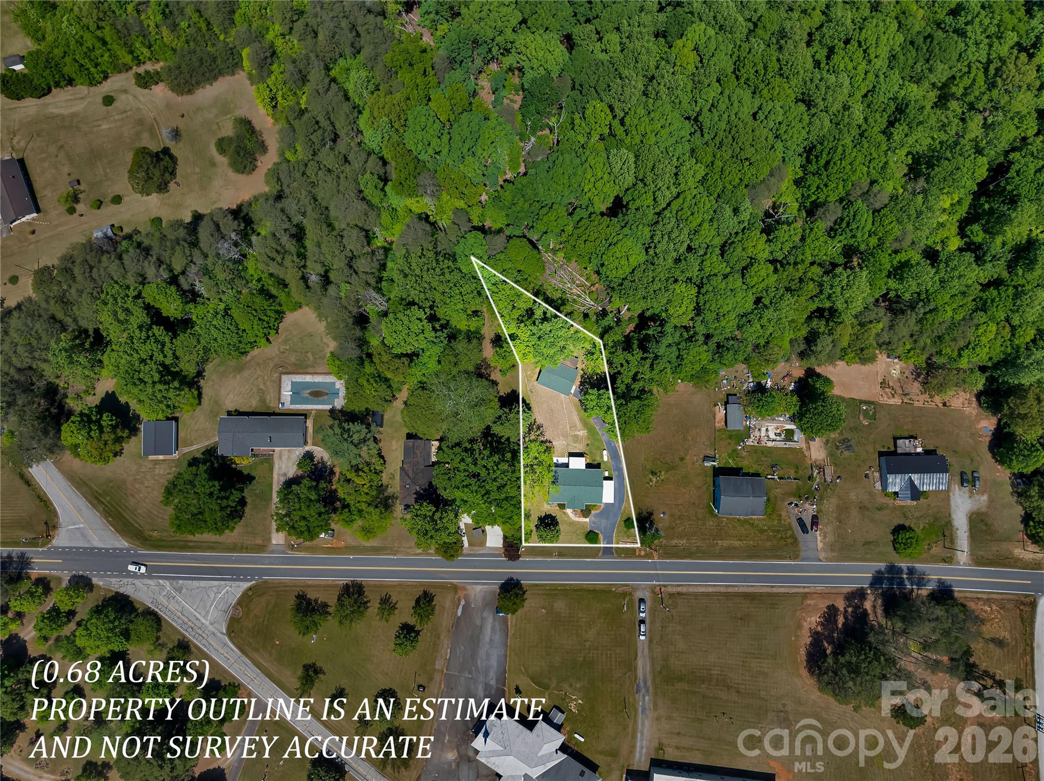 1249 Melvin Hill Road Campobello, SC 29322 - Photo 3 of 41 an aerial view of a house with swimming pool