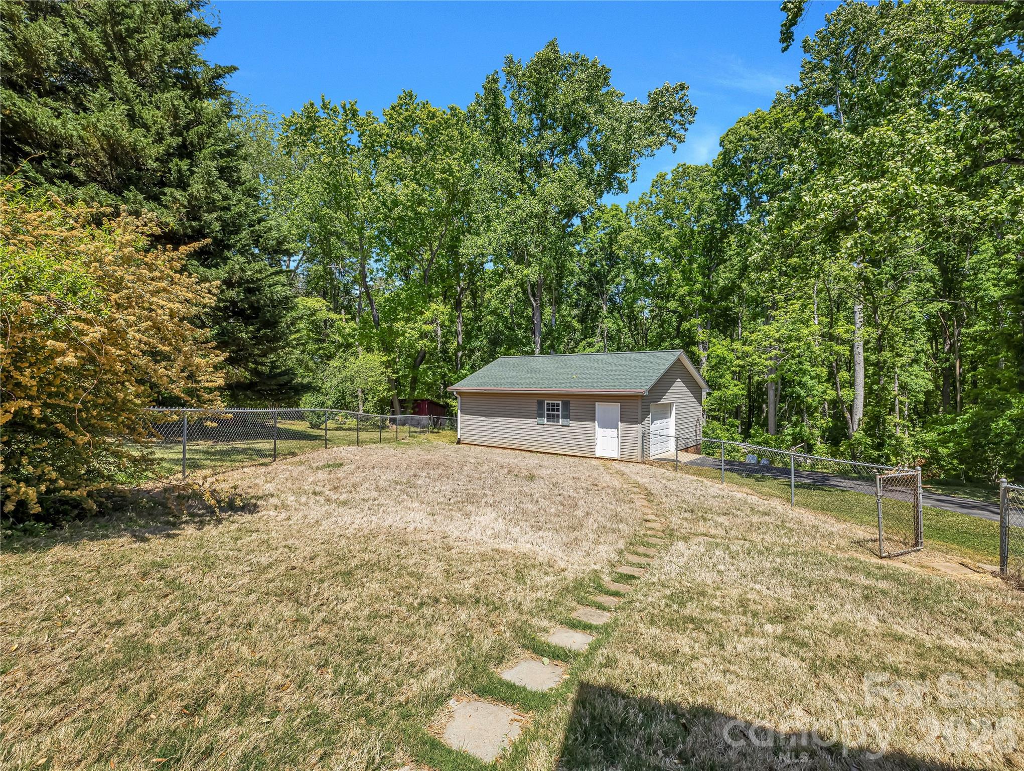 1249 Melvin Hill Road Campobello, SC 29322 - Photo 32 of 41 a front view of a house with a yard