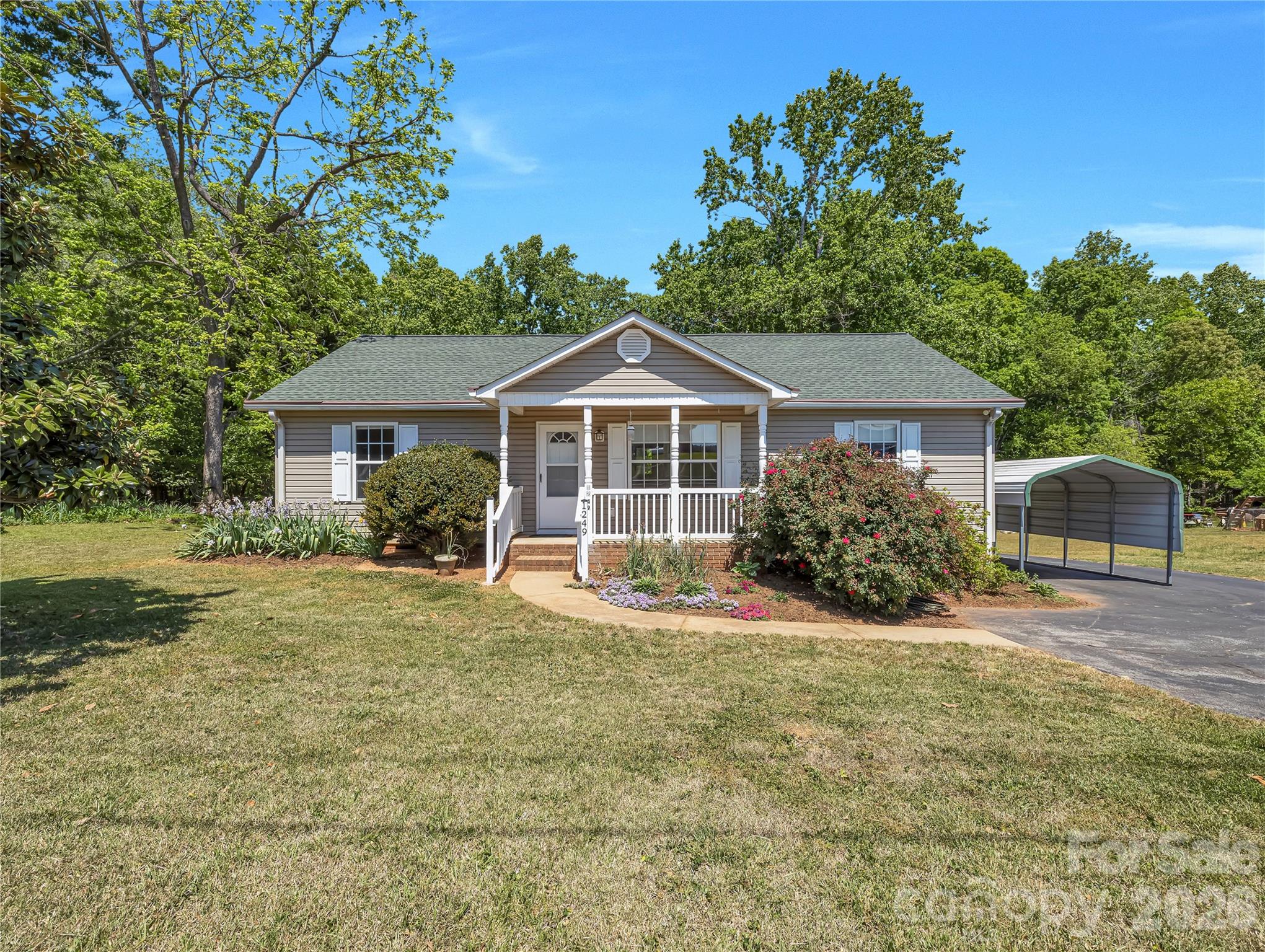 1249 Melvin Hill Road Campobello, SC 29322 - Photo 40 of 41 a front view of a house with a yard